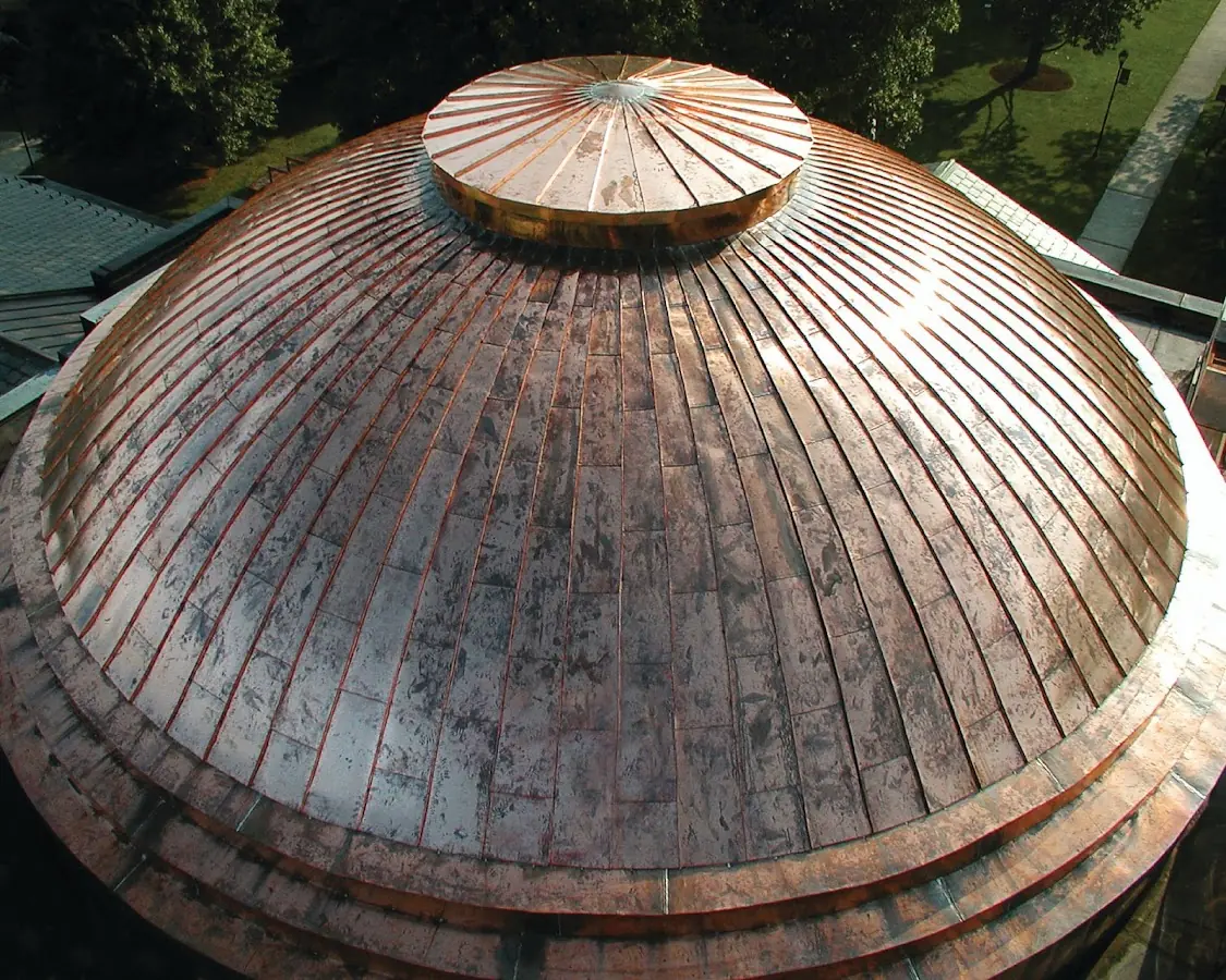 Craftsman Roofing crew installing a new roof in Clemmons